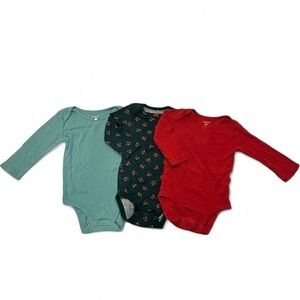 Carter’s long sleeved onesies size 9 months